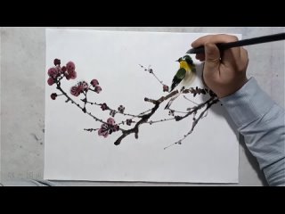 traditional chinese guohua painting (chinese national painting). painting "blossoming plum branch and bird".